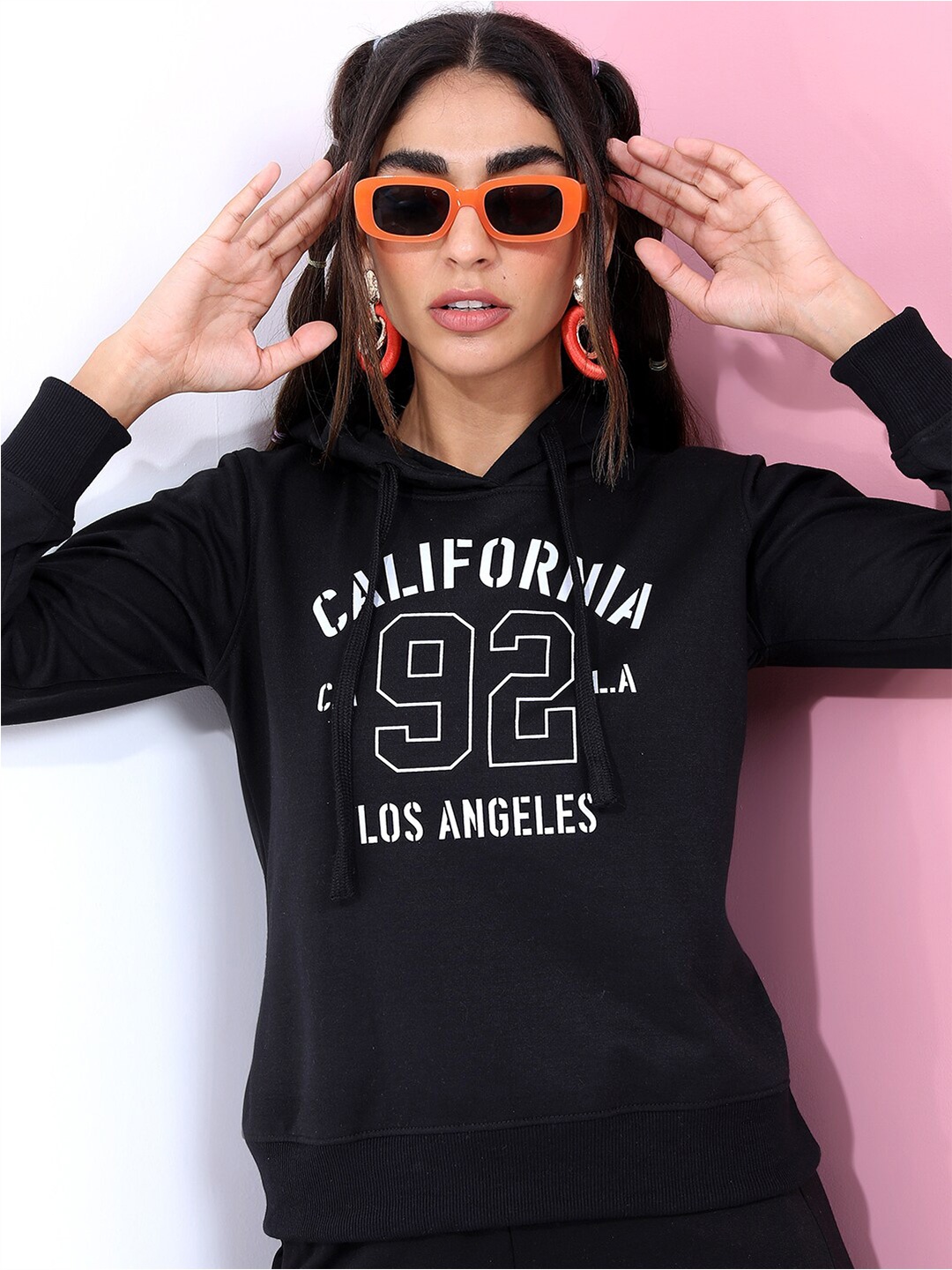 

Tokyo Talkies Women Black Printed Hooded Sweatshirt
