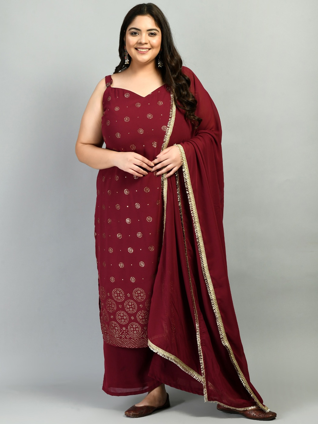 

PrettyPlus by Desinoor com Women Maroon Printed Beads and Stones Kurta Set