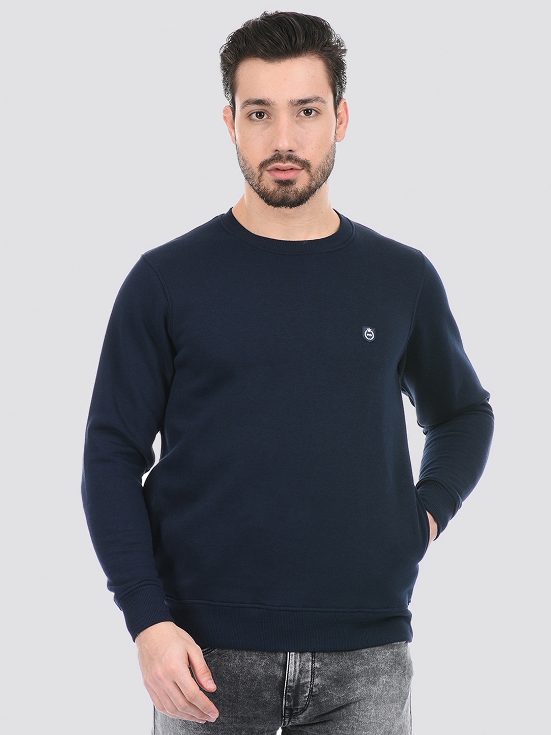

Cloak & Decker by Monte Carlo Men Blue Solid Sweatshirt