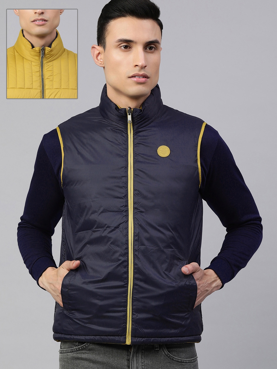 

Kosha Men Yellow & Navy Blue Waterproof Sleeveless Reversible Puffer Jacket