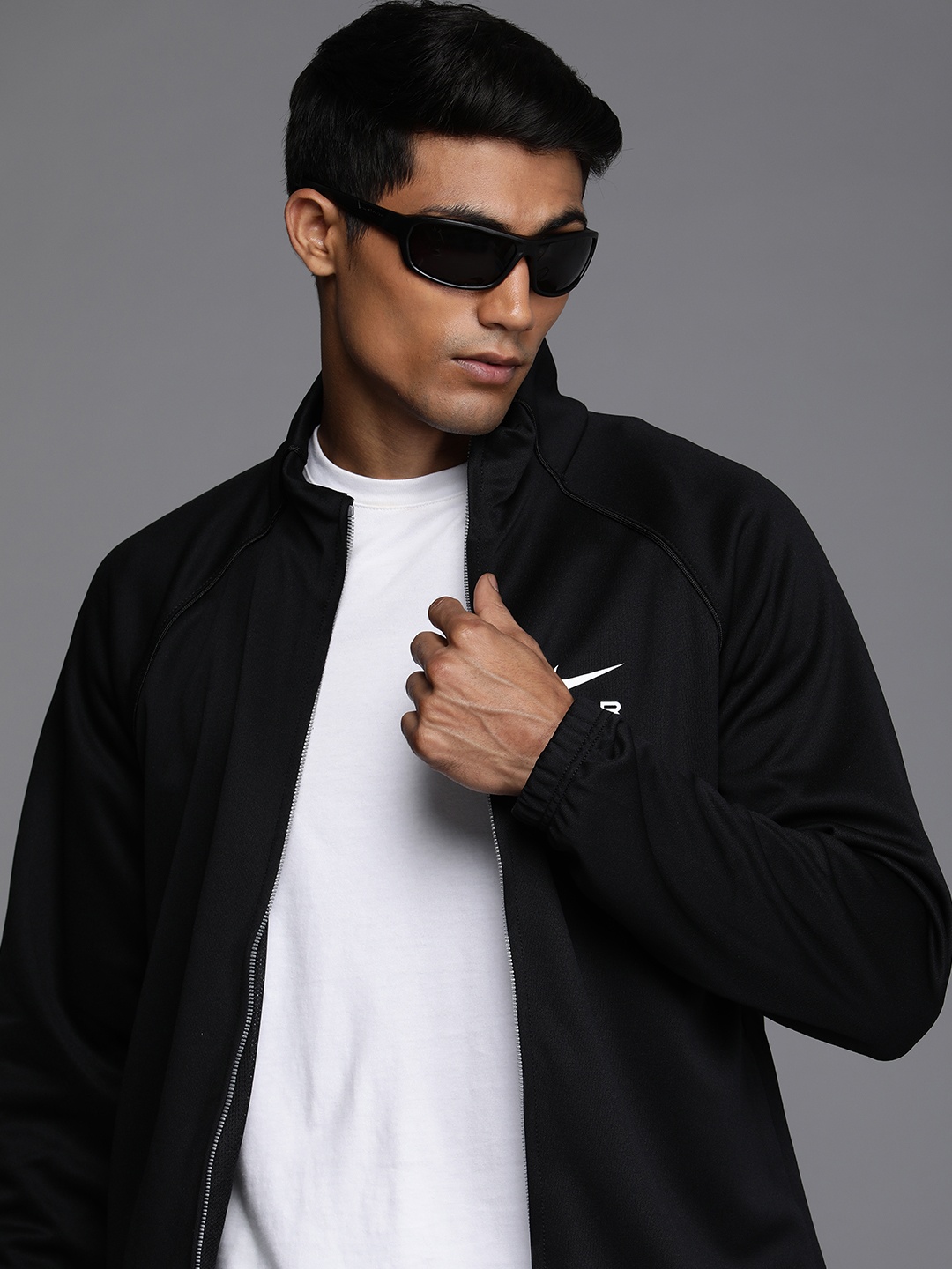 

Nike Men Black Solid Sports Jacket