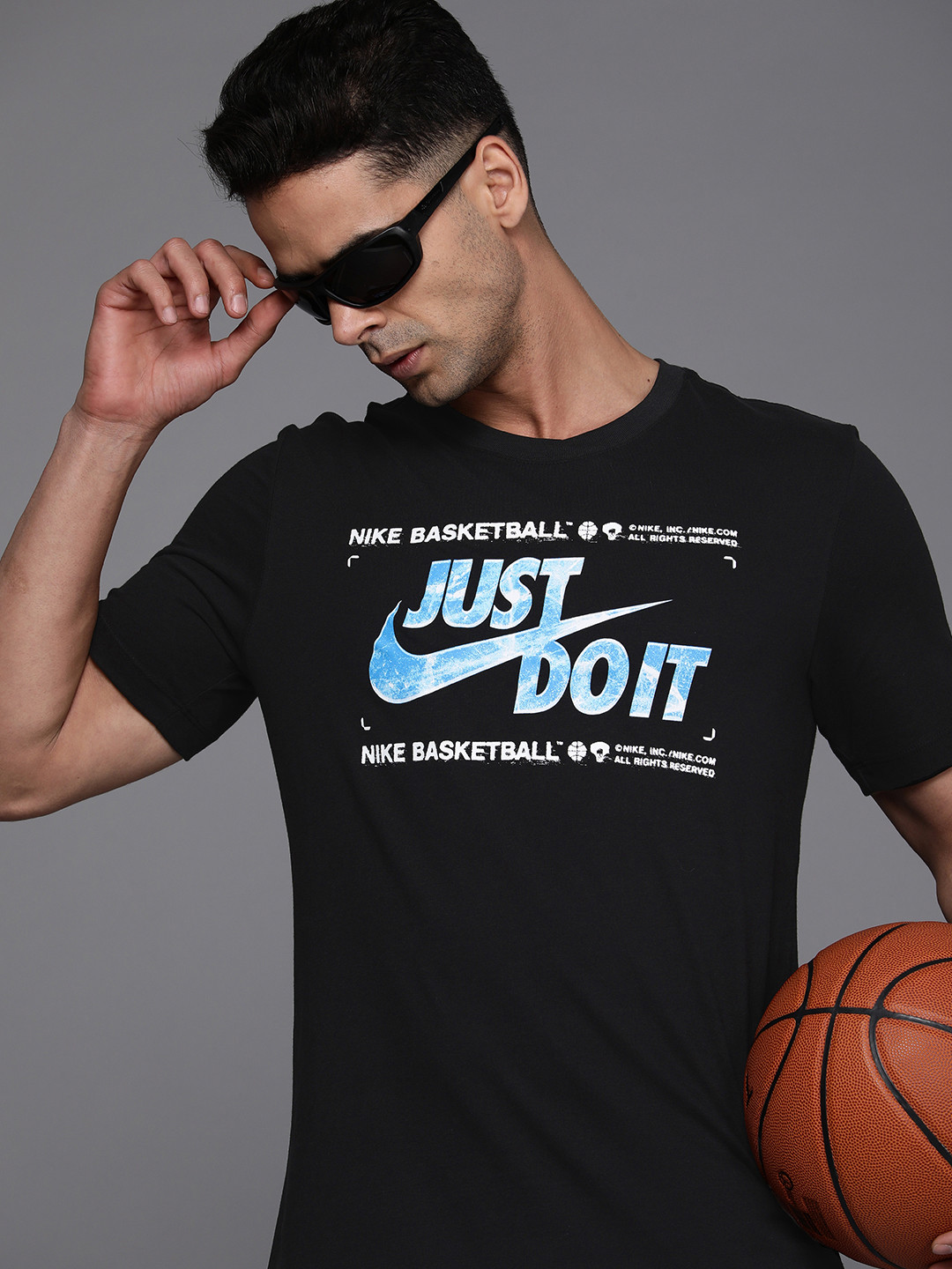 

Nike Men Black & Blue Brand Logo Printed Dri-FIT T-shirt
