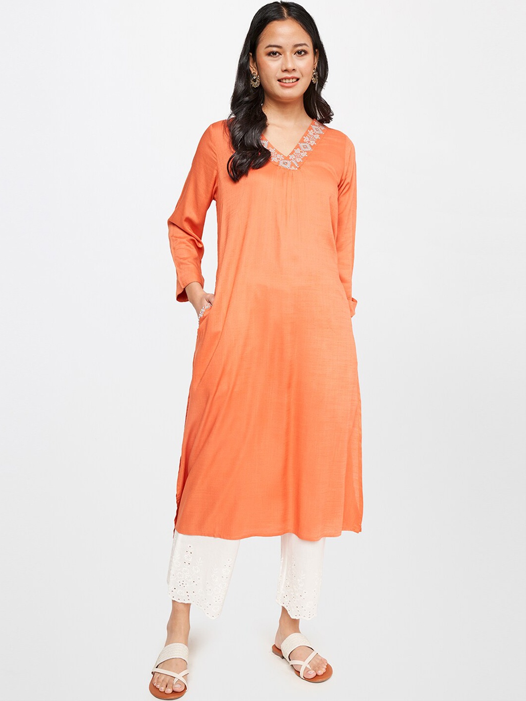 

Global Desi Women Orange Thread Work Solid A-Line Kurta