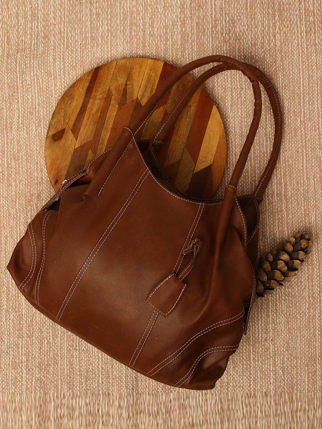 

Fostelo Brown Textured Swagger Handheld Bag