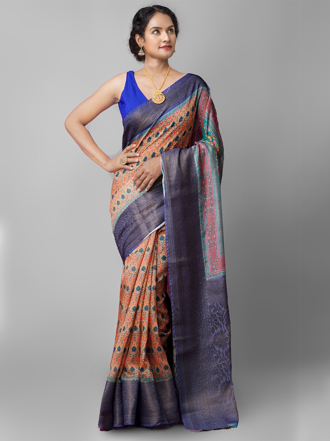 

Unnati Silks Peach-Coloured & Blue Kalamkari Printed Silk Cotton Maheshwari Saree