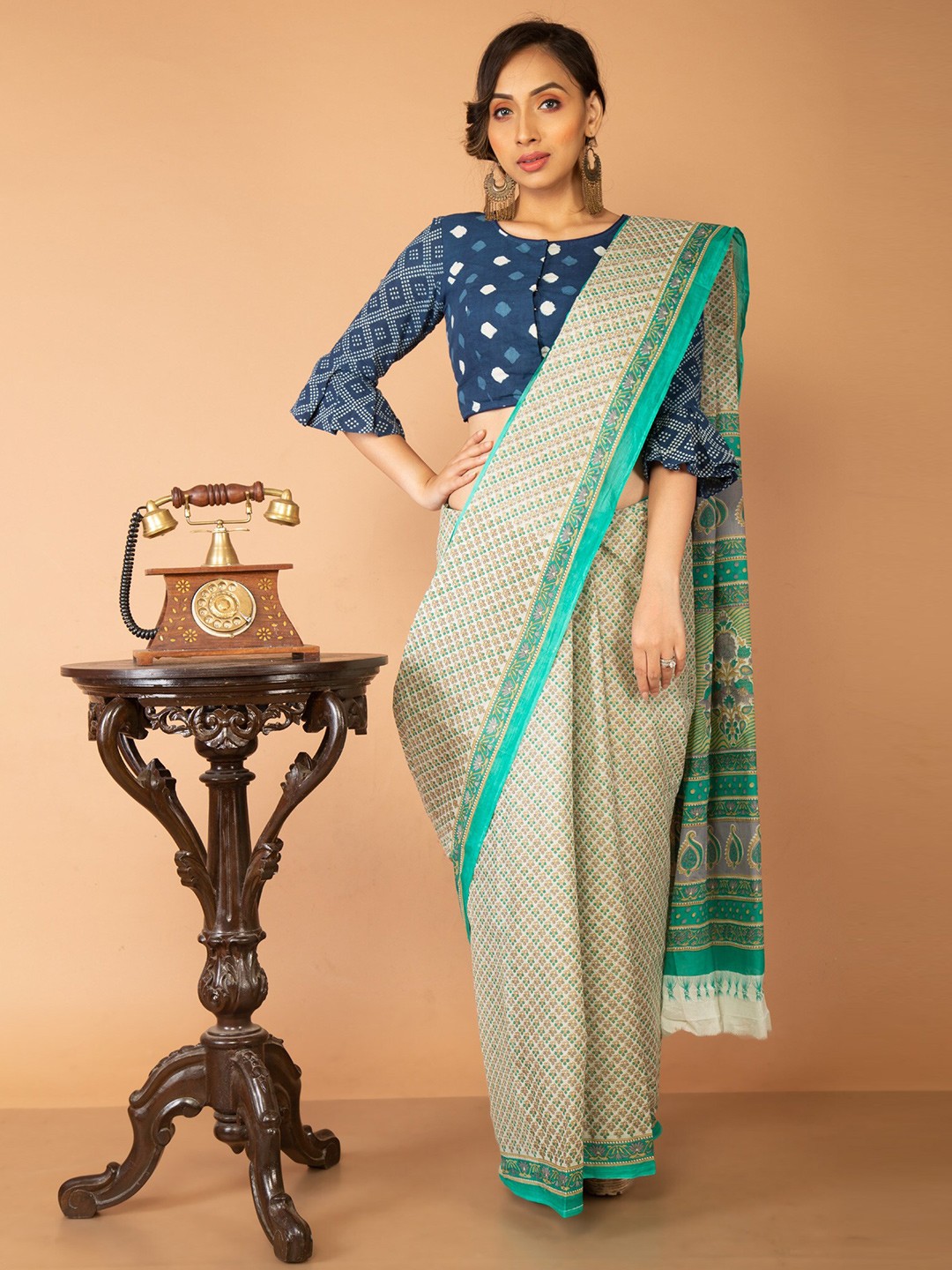 

Unnati Silks Off White & Turquoise Blue Ethnic Motifs Pure Cotton Kovai Saree