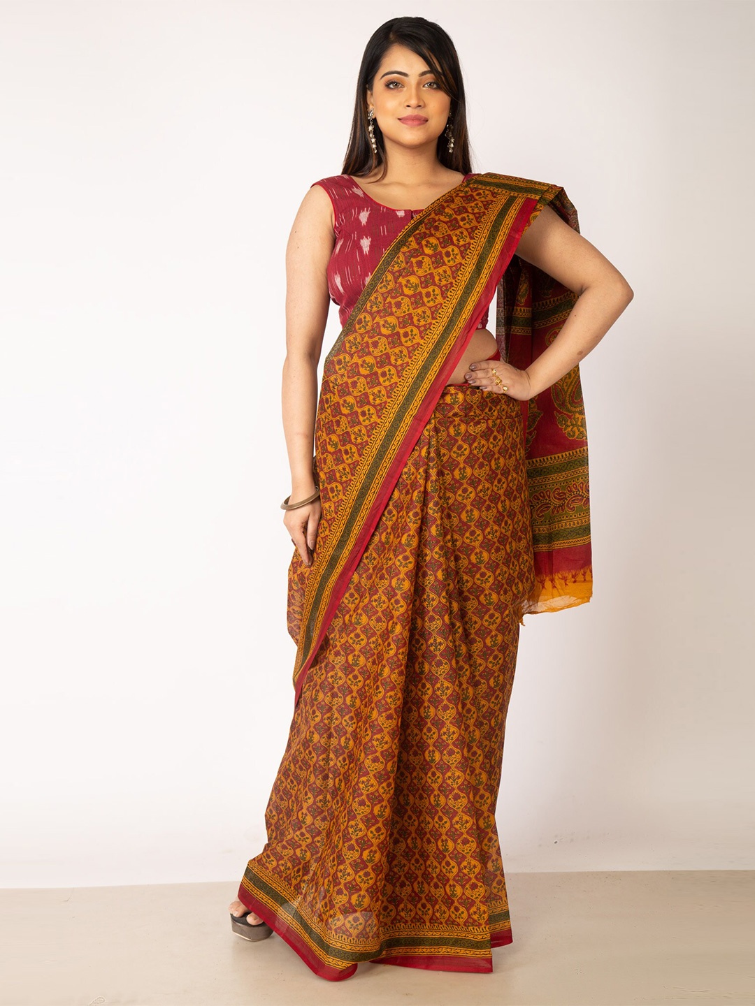 

Unnati Silks Mustard Yellow & Maroon Printed Pure Cotton Kovai Saree