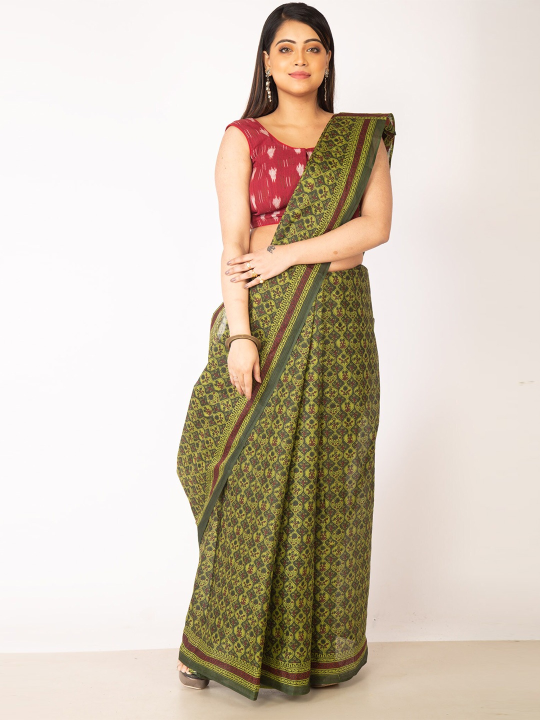 

Unnati Silks Green & Purple Ethnic Motifs Pure Cotton Kovai Saree