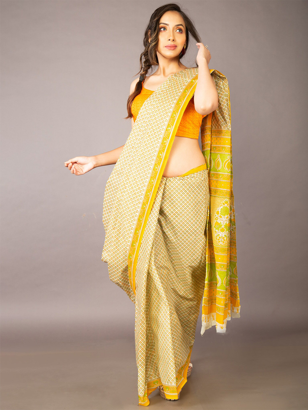 

Unnati Silks Yellow & White Ethnic Motifs Pure Cotton Kovai Saree