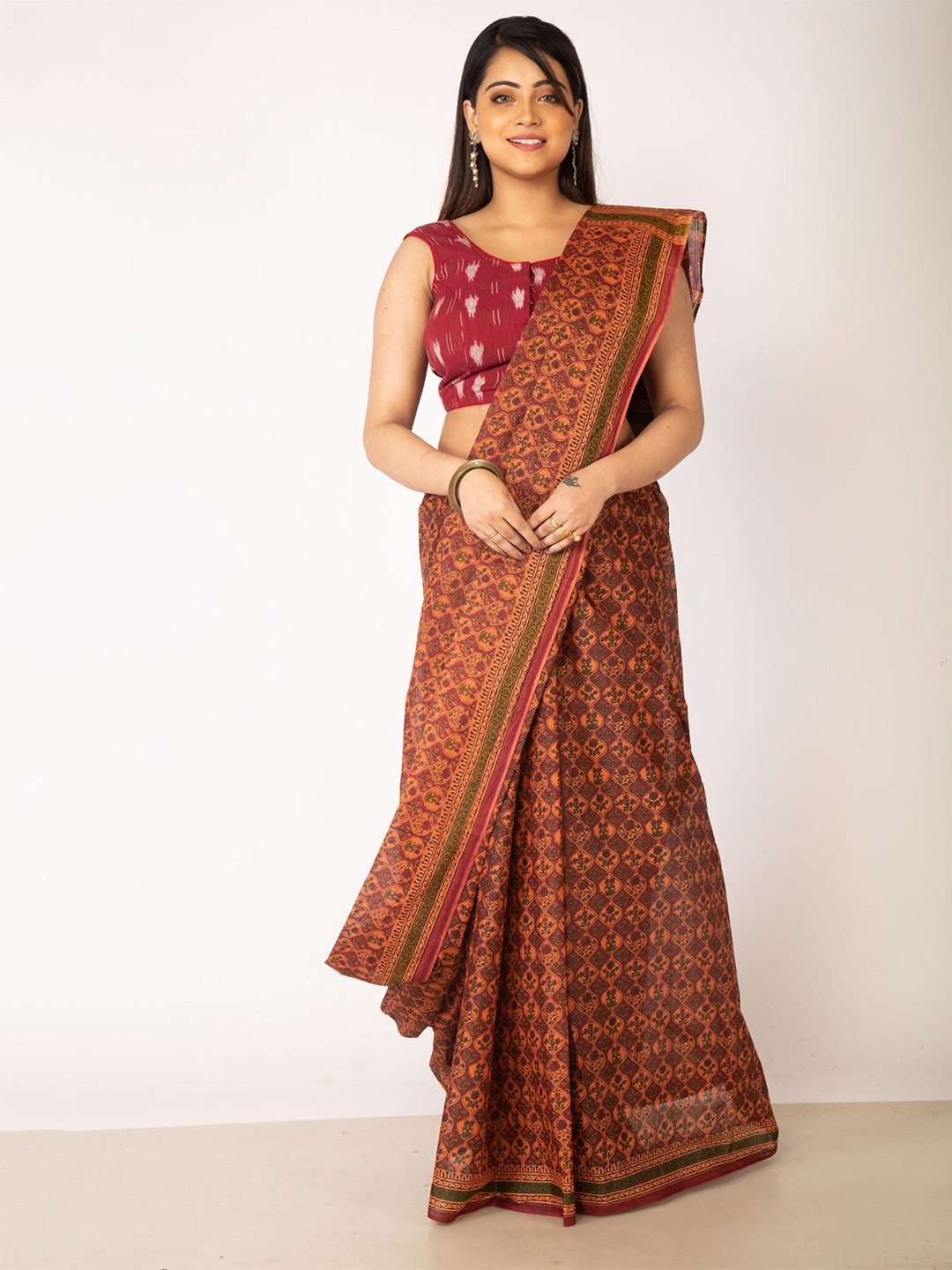 

Unnati Silks Maroon & Green Ethnic Motifs Pure Cotton Kovai Saree