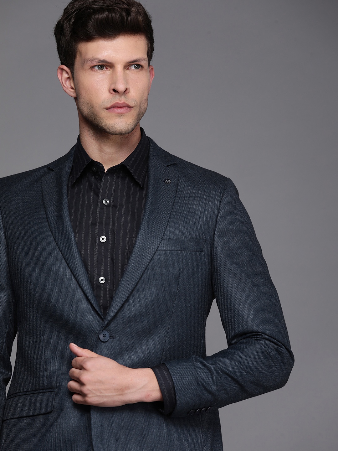 

Raymond Men Navy Blue Slim Fit Self-Design Single-Breasted Formal Blazer