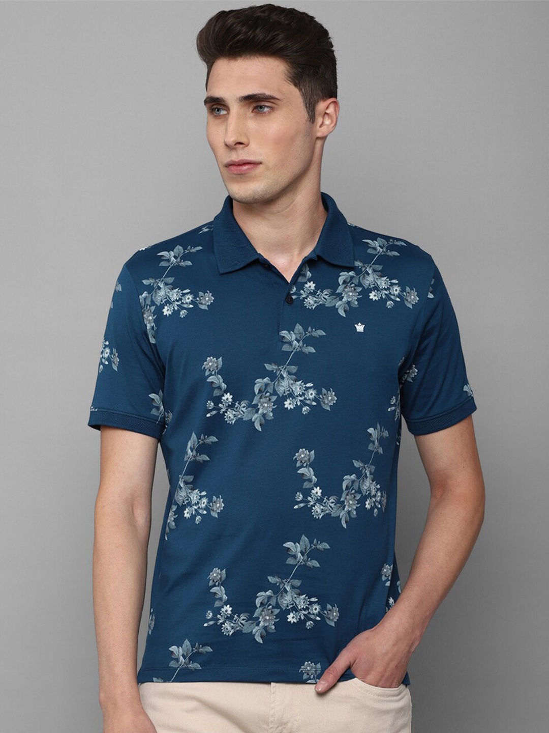 

Louis Philippe Sport Men Blue Floral Printed Polo Collar T-shirt