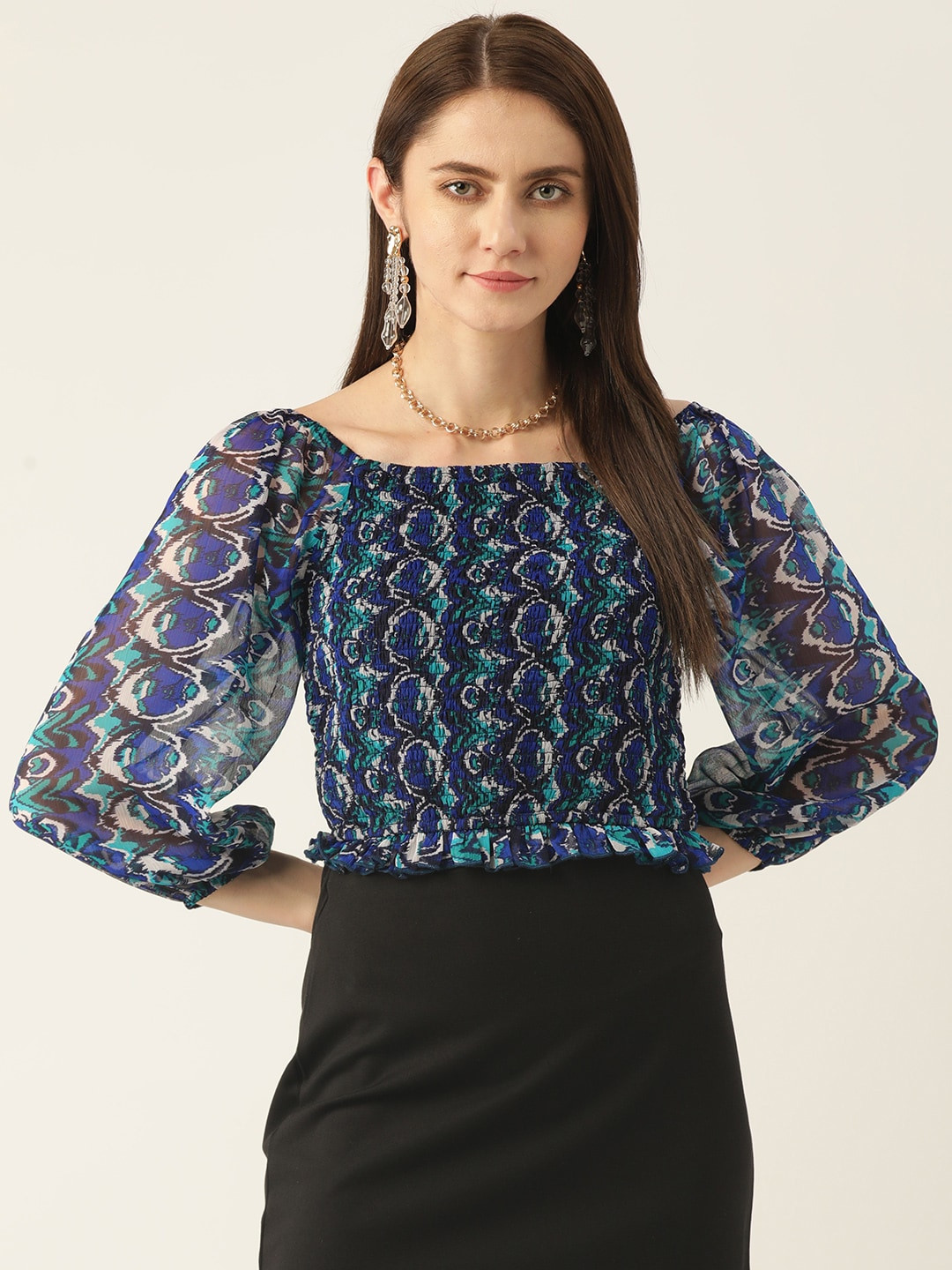 

Antheaa Blue Printed Bishop Sleeves Smocked Chiffon Crop Top