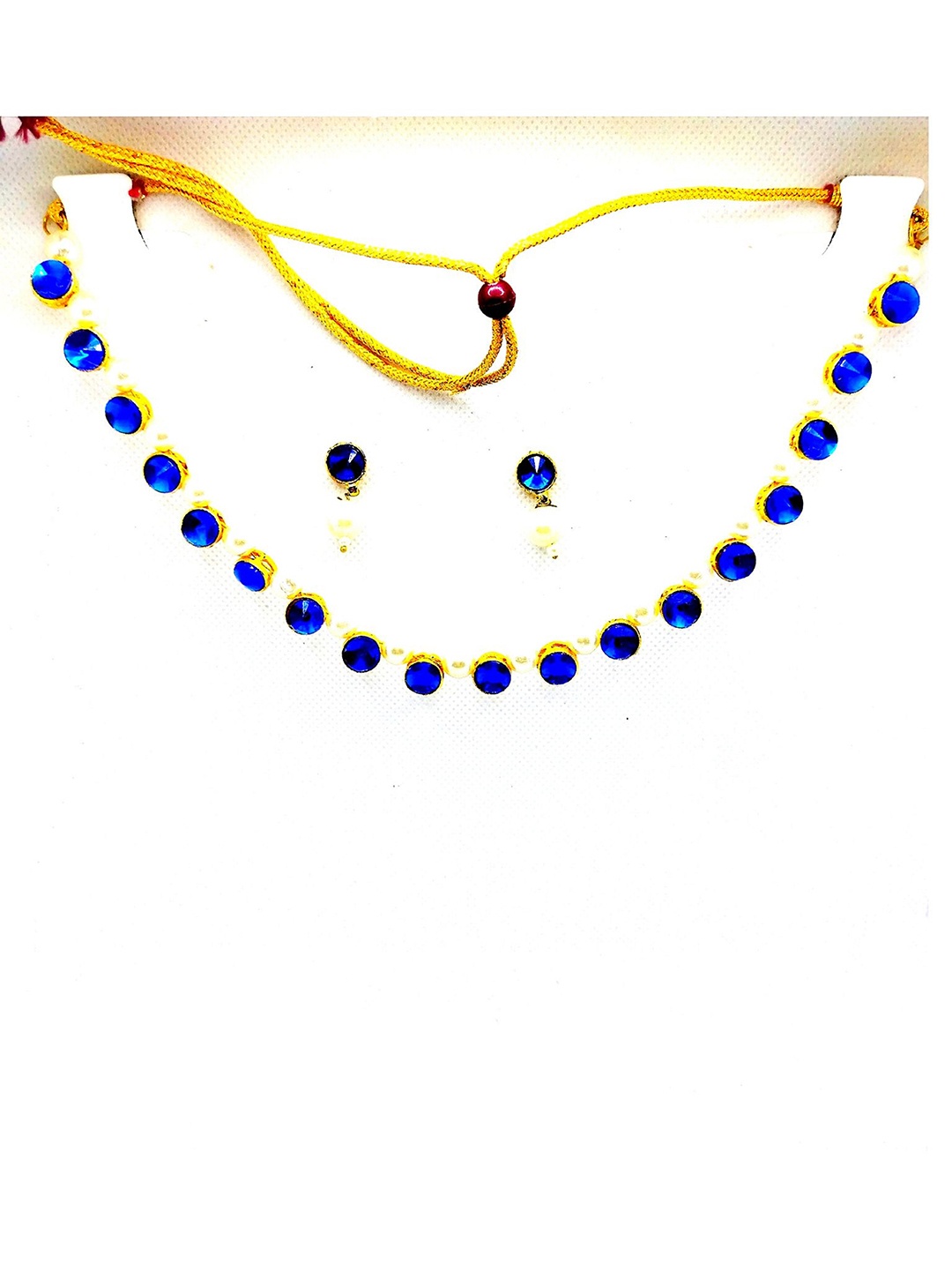 

Kshitij Jewels Gold-Plated Navy Blue & White Kundan Studded & Beaded Jewellery Set