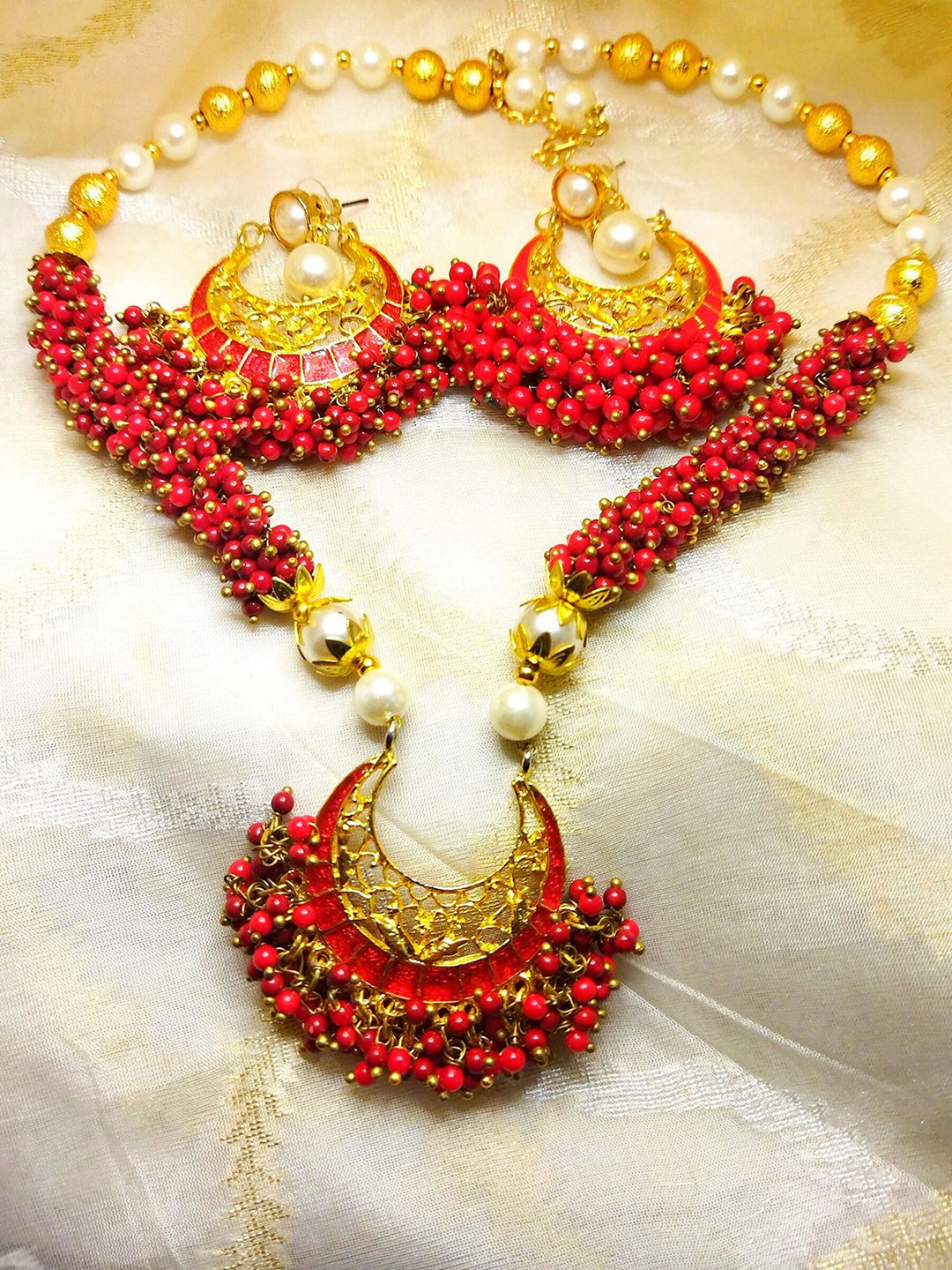 

Kshitij Jewels Gold-Plated & Red Beaded Jewellery Set