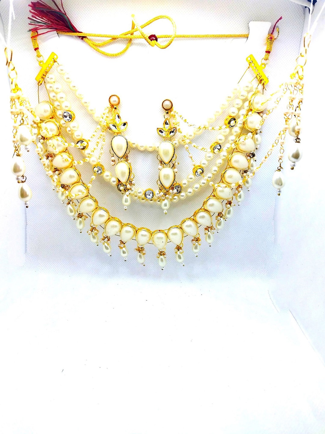 

Kshitij Jewels Gold-Plated White Stone-Studded & Pearl Beaded Jewellery Set