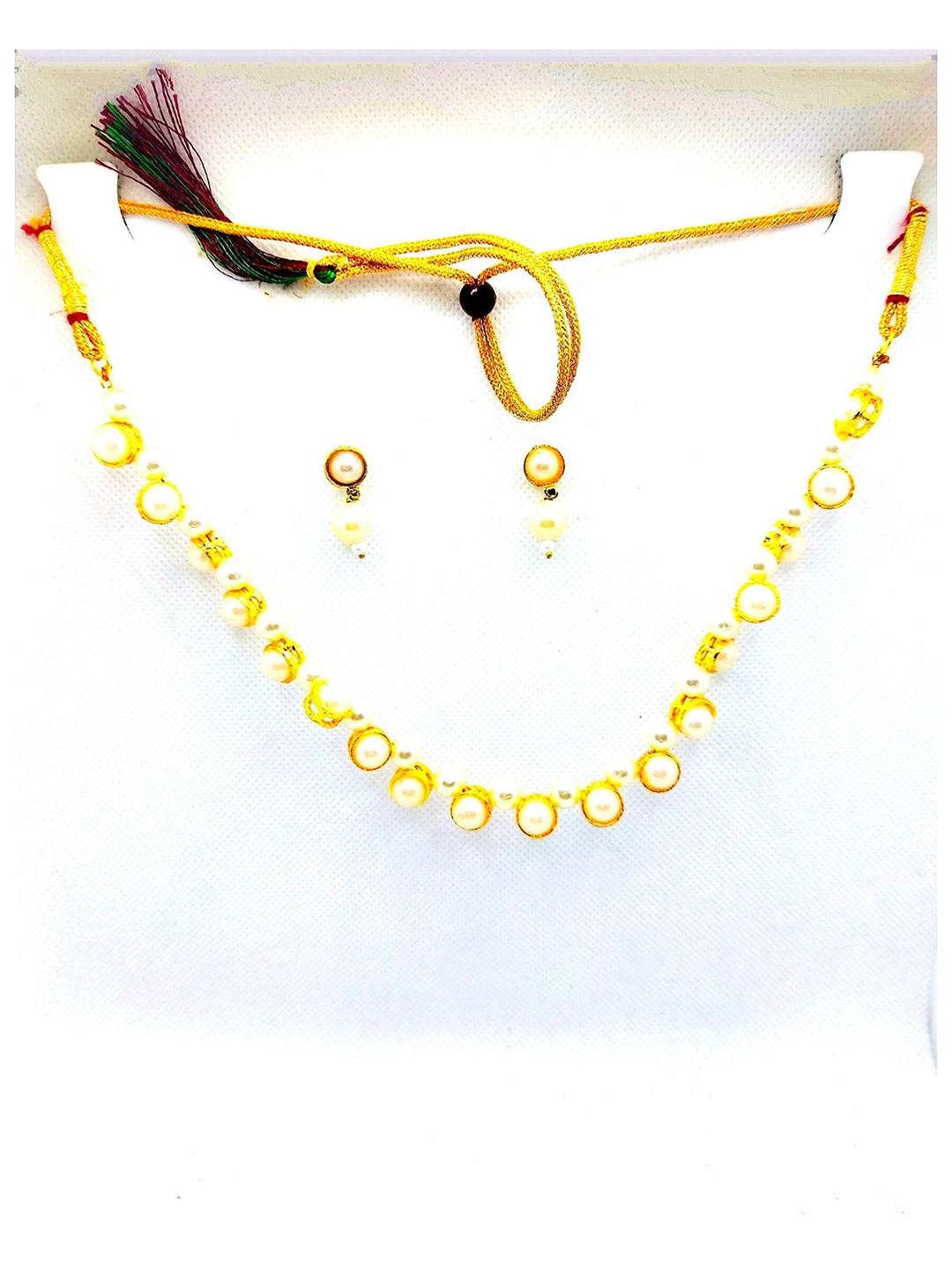 

Kshitij Jewels Gold-Plated Off White Artificial Stones Studded Jewellery Set