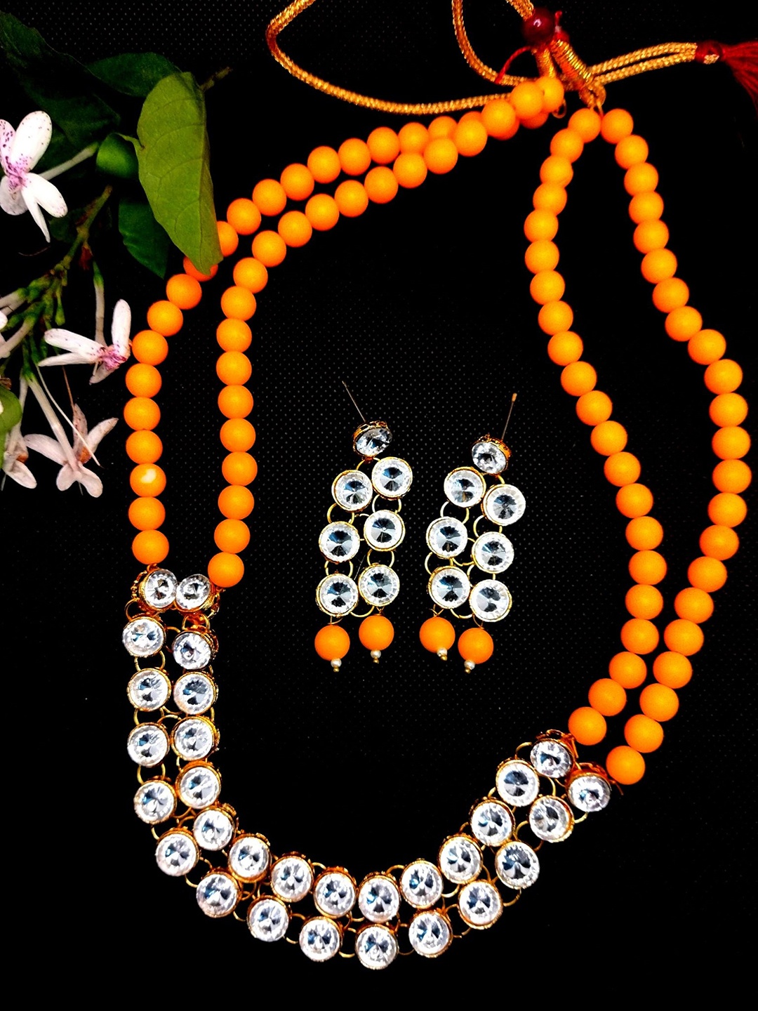 

Kshitij Jewels Gold-Plated & Yellow Stone-Studded Beaded Jewellery Set