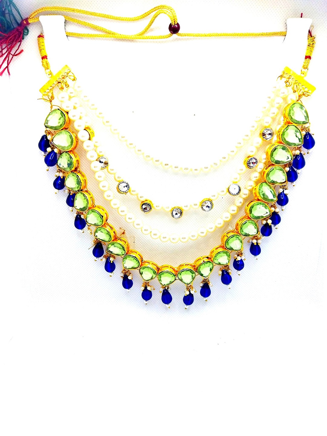 

Kshitij Jewels Gold-Plated Green & Blue Stone-Studded & Beaded Jewellery Set