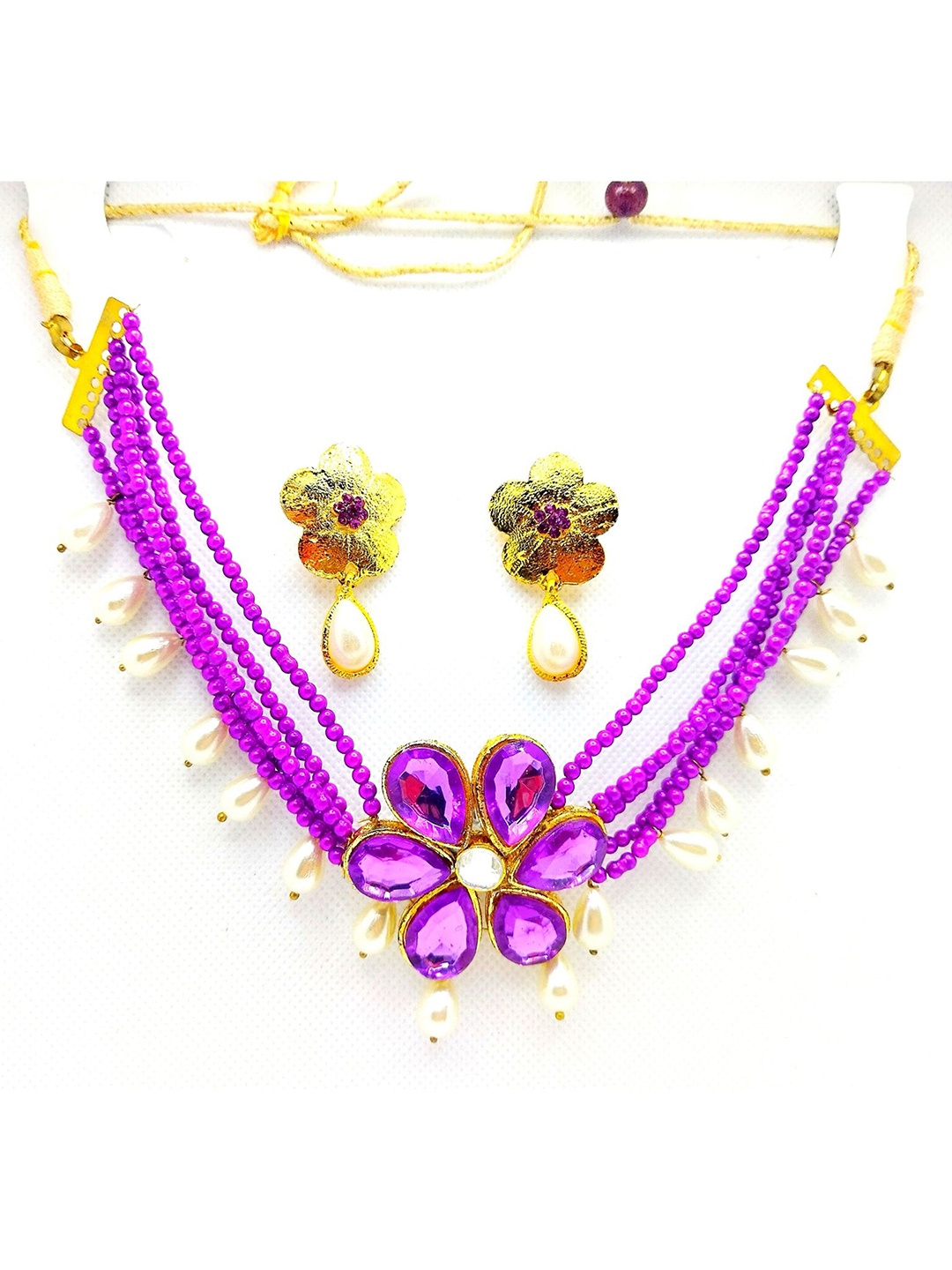 

Kshitij Jewels Gold-Plated Purple Artificial Stones & Beads-Beaded Jewellery Set