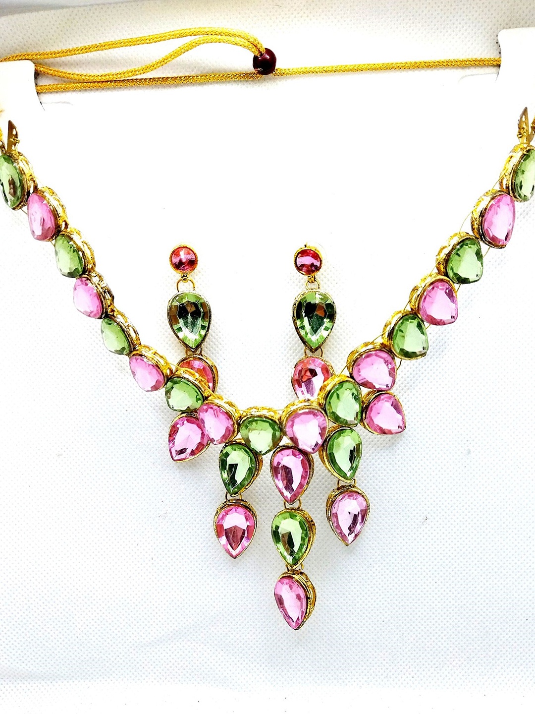 

Kshitij Jewels Gold-Plated Pink Stone-Studded Jewellery Set