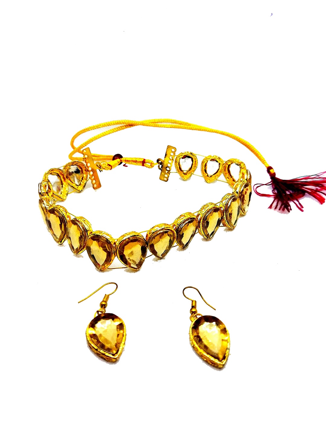 

Kshitij Jewels Gold-Plated & Yellow Stones-Studded & Beaded Jewellery Set