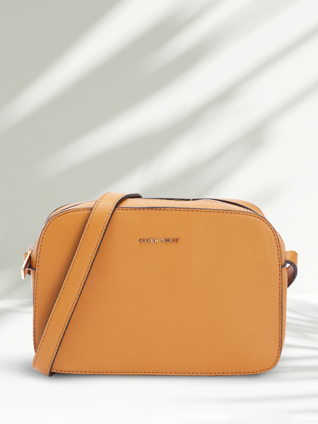 

Allen Solly Solid Sling Bag, Mustard