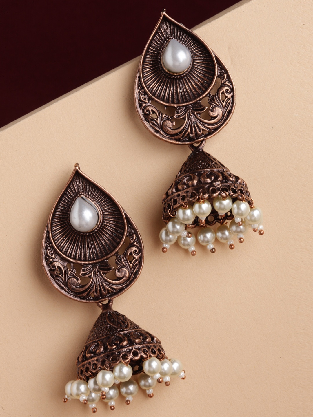 

PANASH Copper-Toned Dome Shaped Jhumkas Earrings