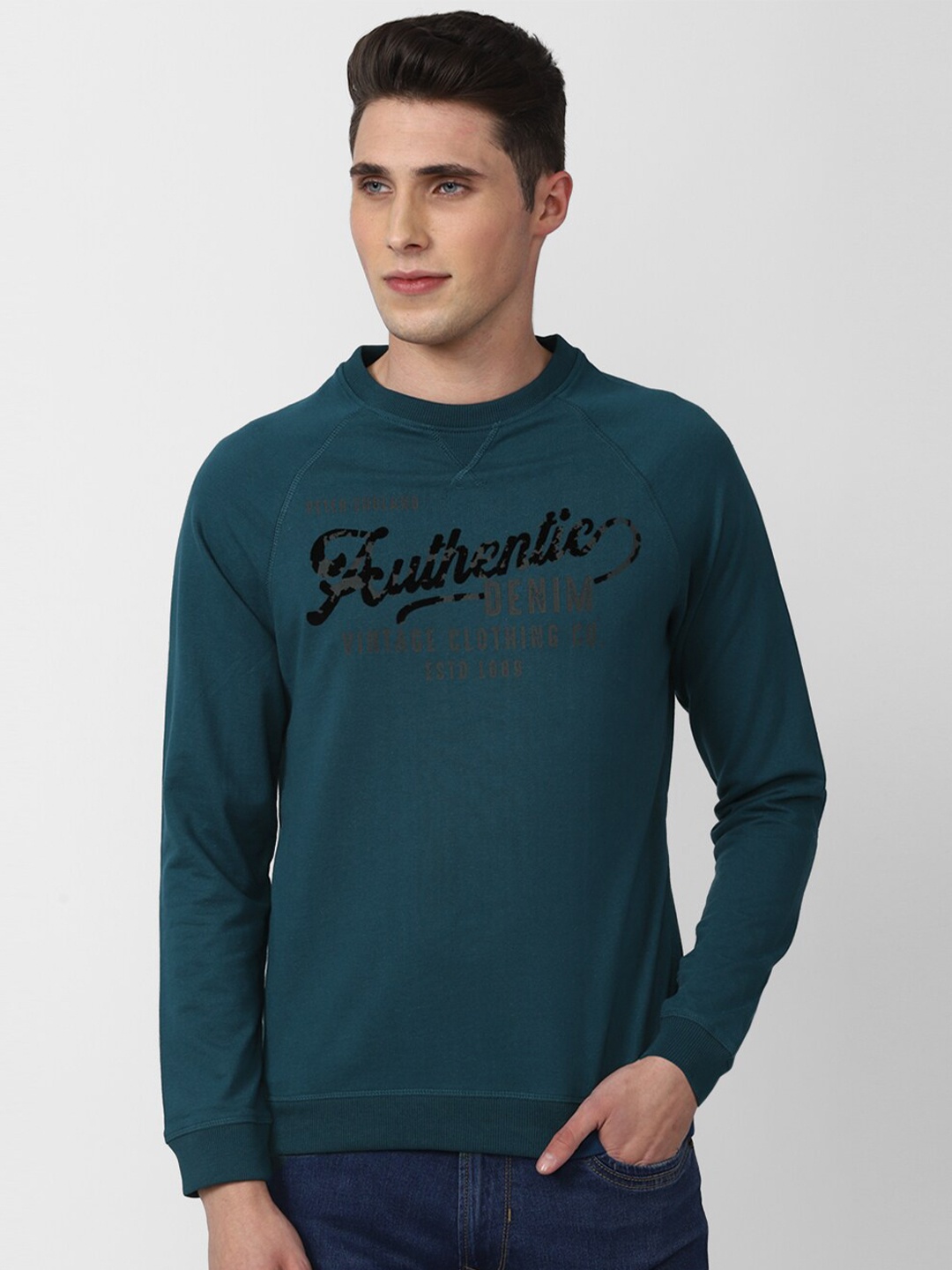 

Peter England Casuals Men Blue Printed Sweatshirt