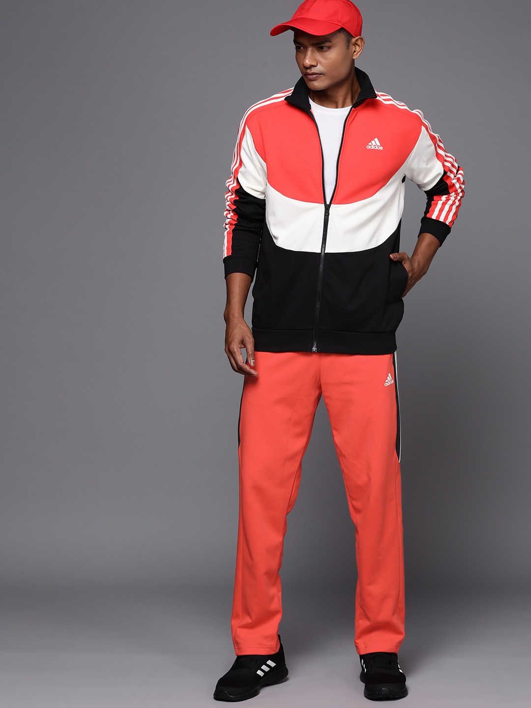 

ADIDAS Sustainable Colourblocked Classics Striped Regular Fit Tracksuit, Coral