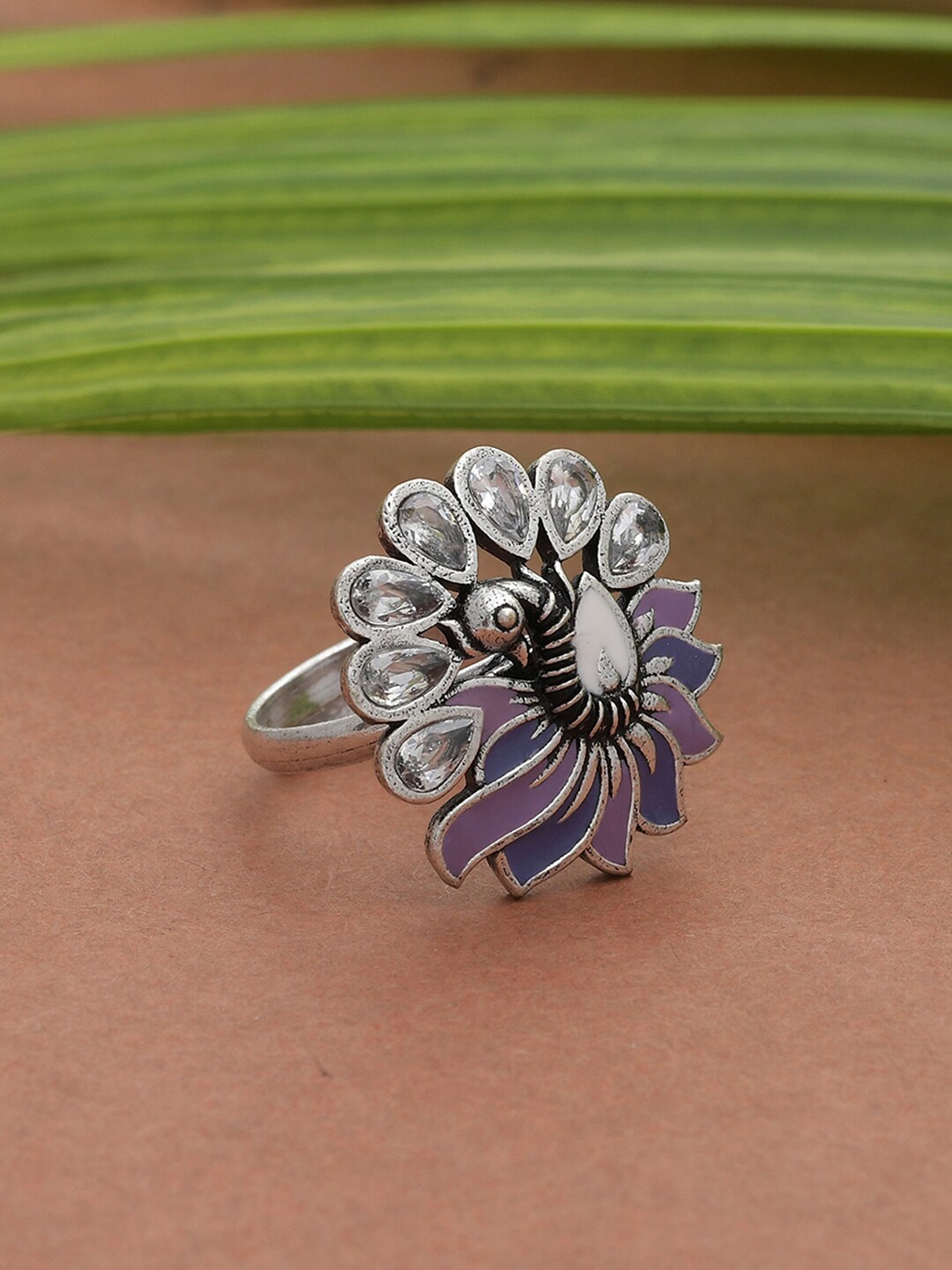 

Voylla Women Silver-Plated White Kundan Studded & Enamelled Peacock Finger Ring