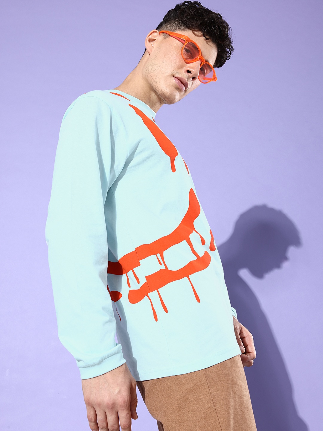 

Difference of Opinion Men Turquoise Blue & Orange Printed Pure Cotton Oversized T-shirt