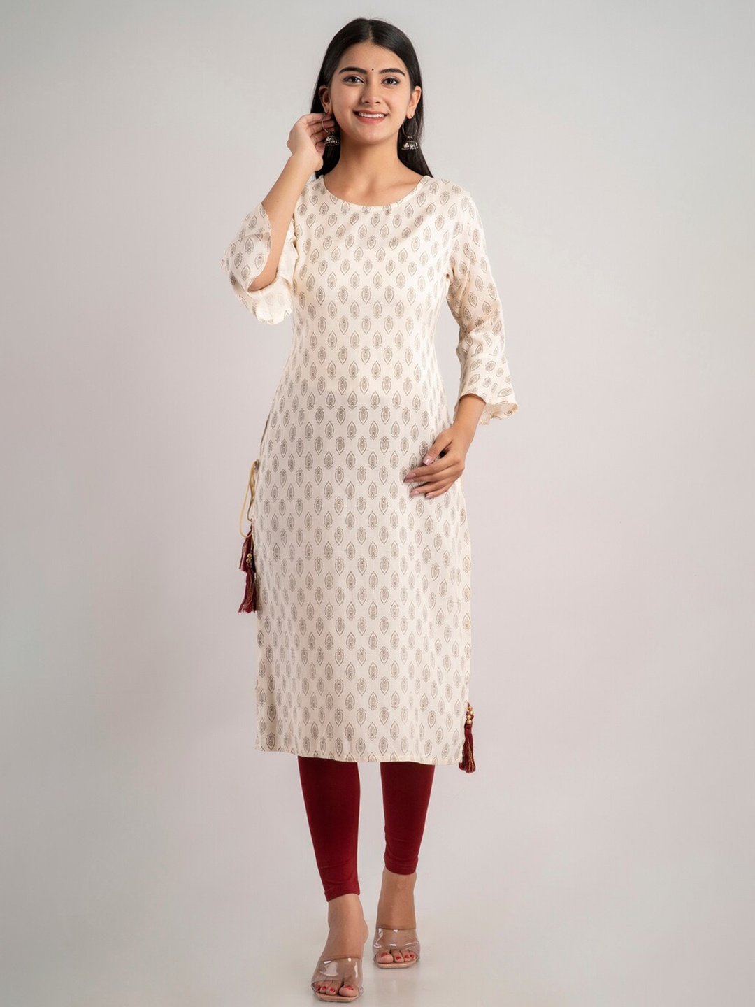 

MAUKA Women Cream-Coloured & Gold-Toned Ethnic Motifs Printed Bell Sleeves Kurta