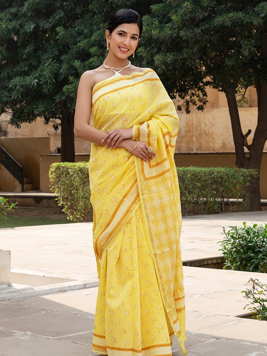 

Ambraee Yellow & White Floral Ready to Wear Bagru Saree