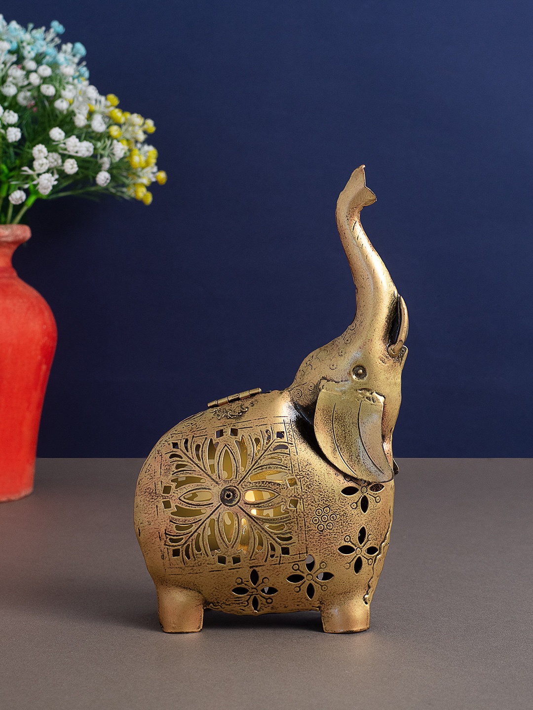 

Golden Peacock Gold-Toned Elephant Design Candle Holder