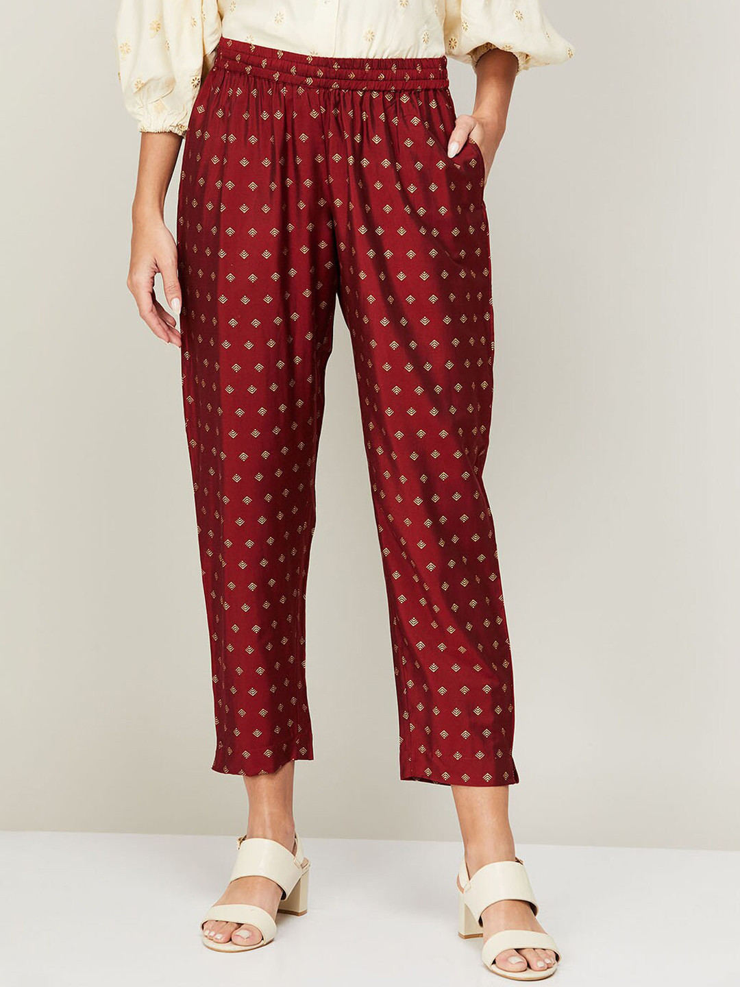 

Melange by Lifestyle Women Maroon Ethnic Motifs Printed Trousers