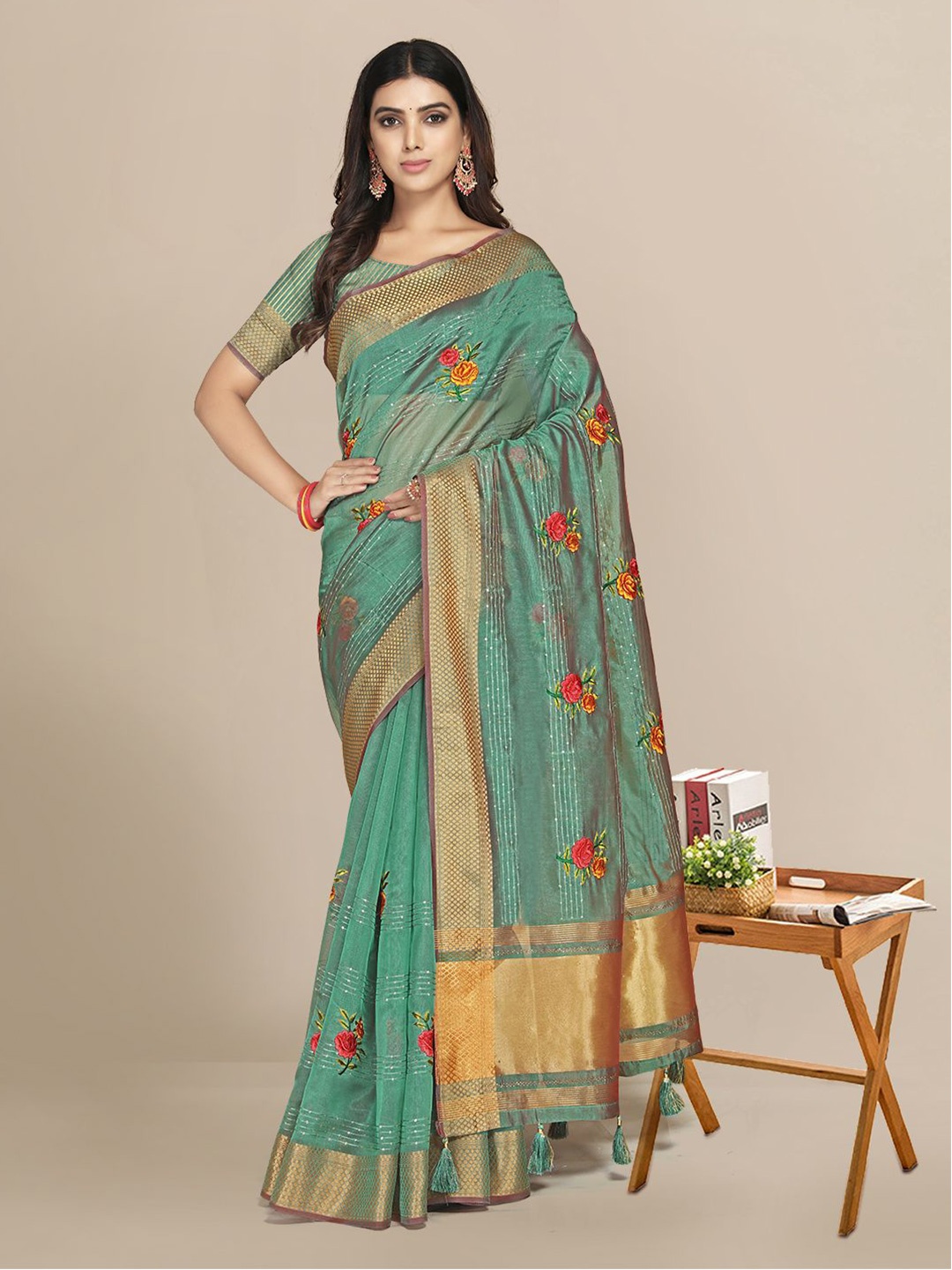 

Mitera Teal Floral Zari Organza Saree