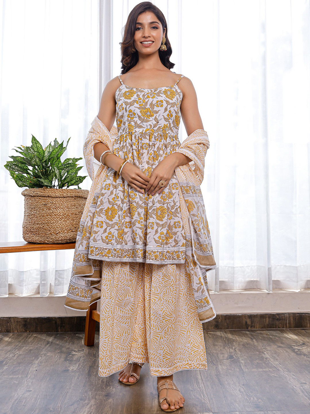 

PHEETA Women Peach-Coloured Floral Printed Layered Pure Cotton Kurta with Palazzos & With Dupatta