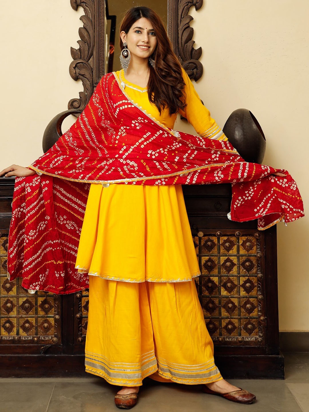 

PHEETA Women Yellow Layered Kurta with Palazzos & With Dupatta