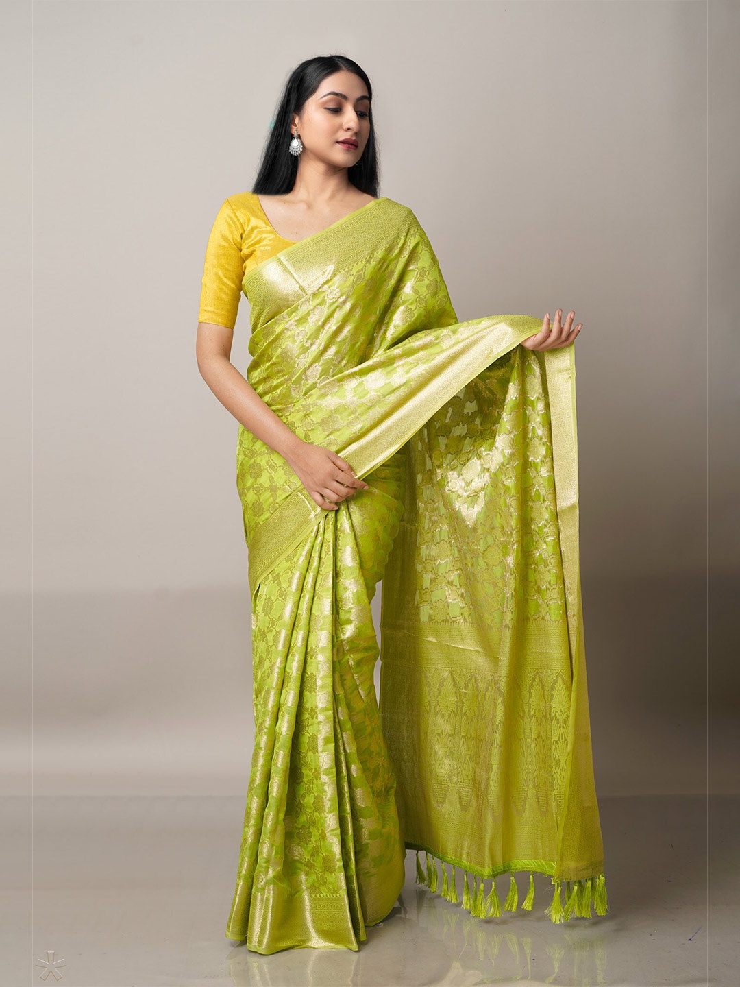 

Unnati Silks Green Ethnic Motifs Zari Silk Blend Banarasi Saree