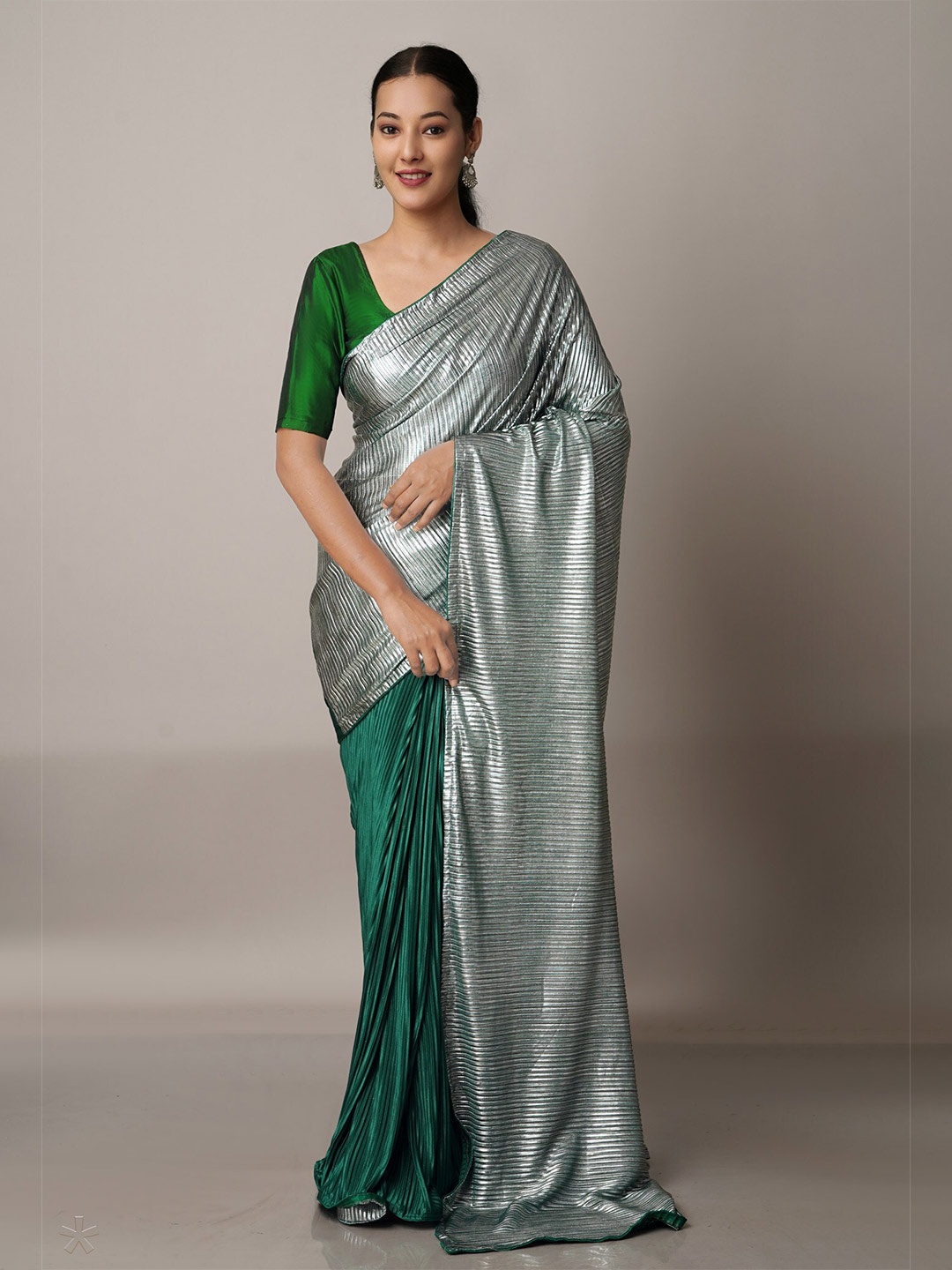 

Unnati Silks Green & Silver-Toned Striped Baluchari Saree