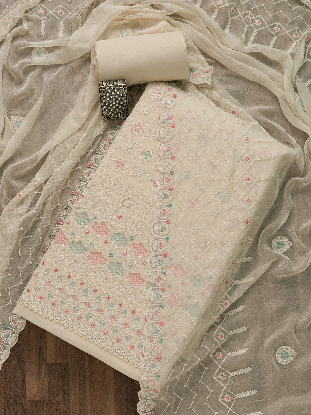 

Koskii Cream-Coloured & Green Embroidered Unstitched Dress Material