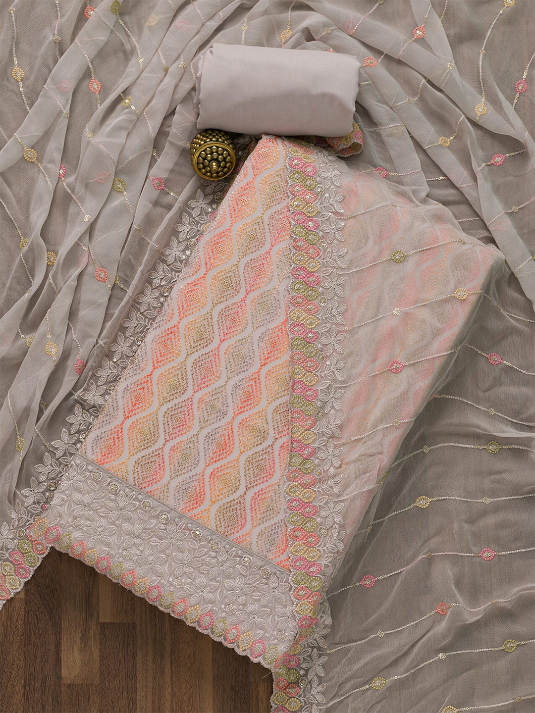 

Koskii Grey & White Embroidered Unstitched Dress Material
