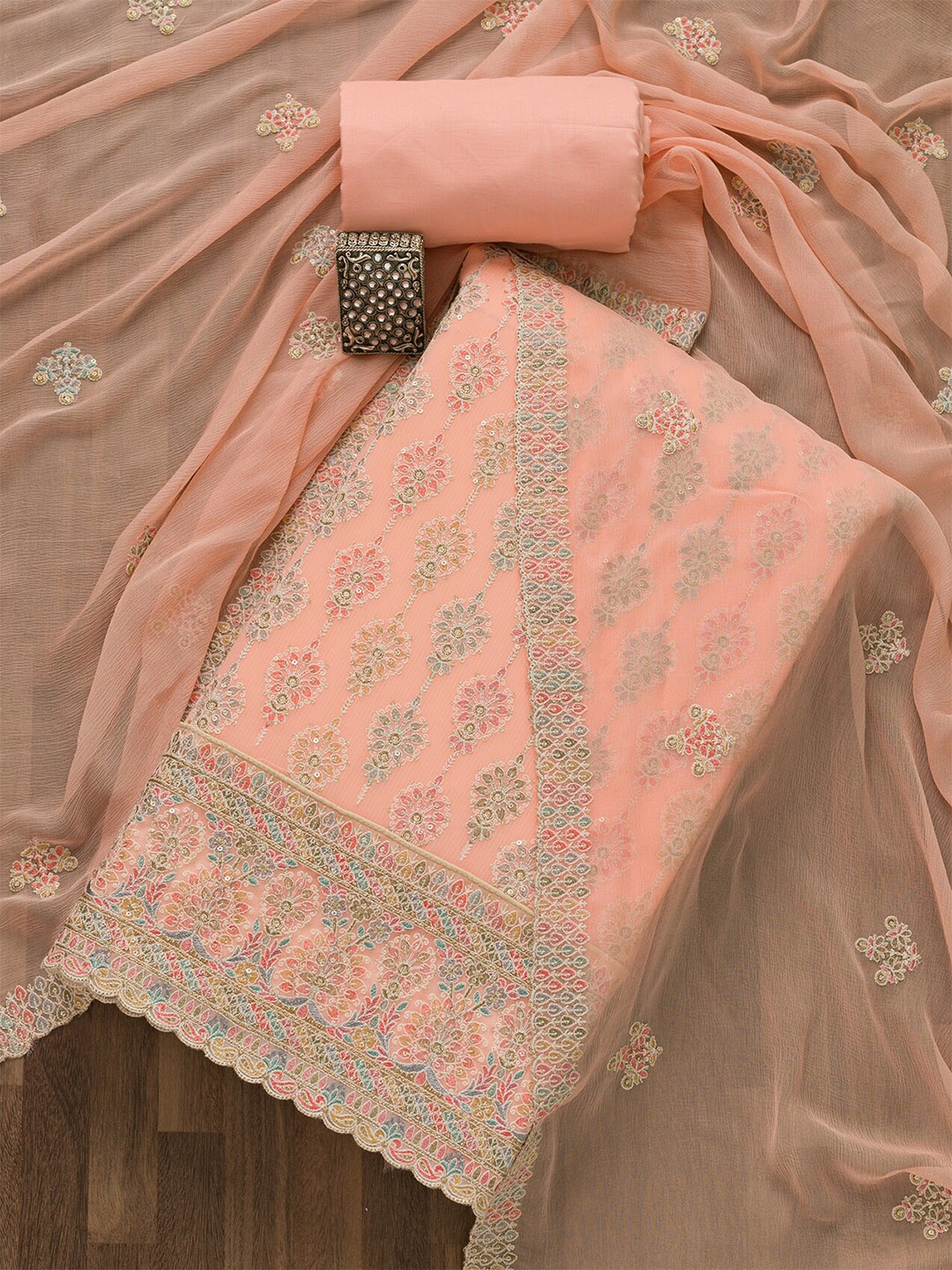 

Koskii Peach-Coloured & Green Embellished Unstitched Dress Material