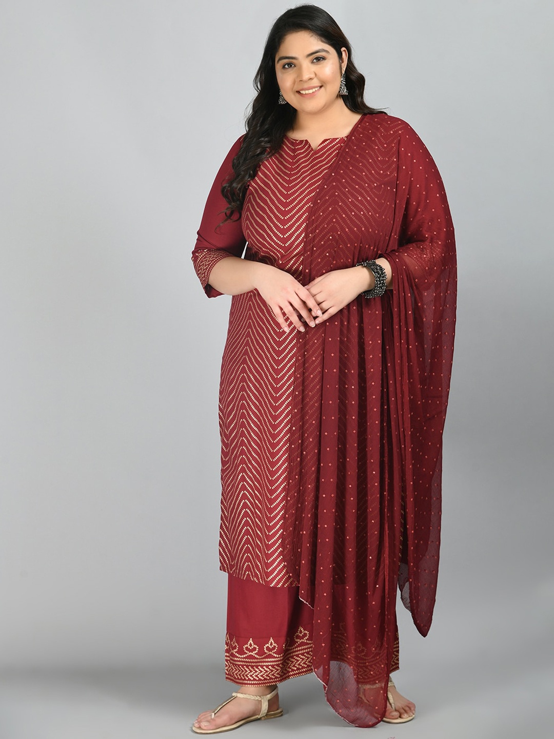

PrettyPlus by Desinoor.com Women Maroon Ethnic Motifs Printed Kurta with Palazzos With Dupatta