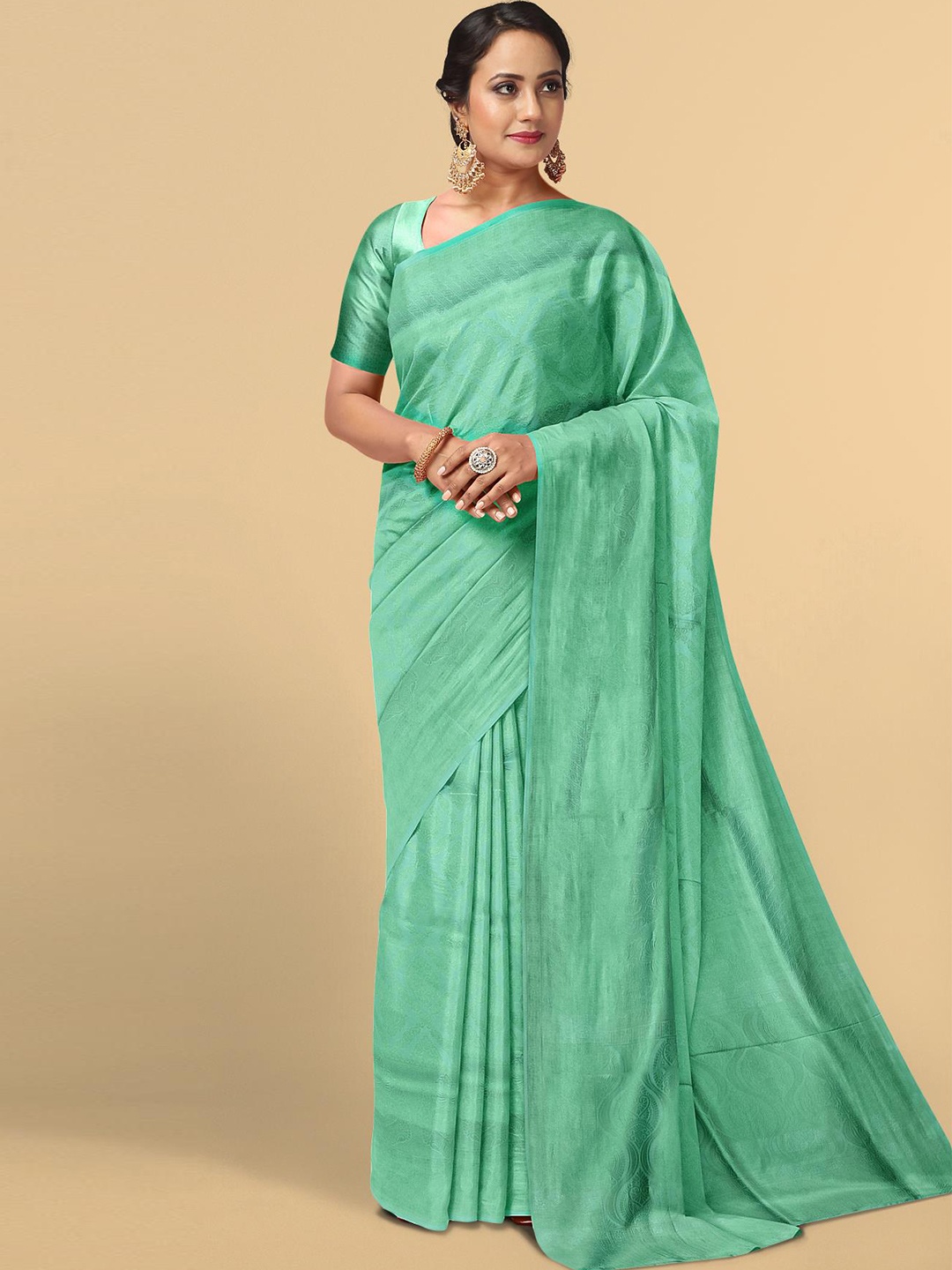 

Kalamandir Sea Green Ethnic Motifs Zari Silk Blend Saree