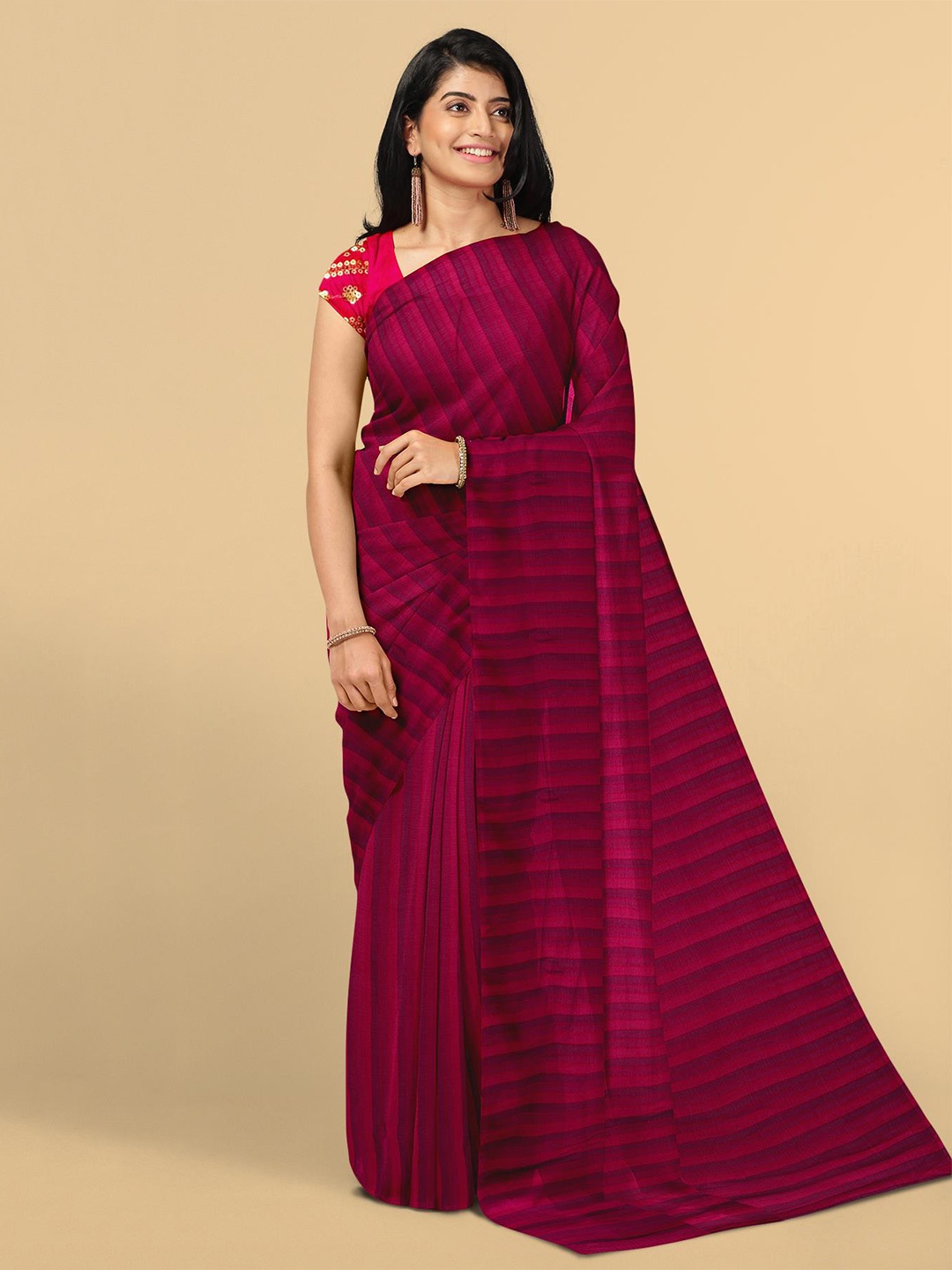 

Kalamandir Women Pink Striped Silk Blend Saree