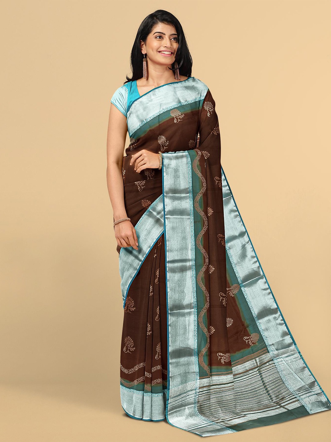 

Kalamandir Brown & Silver-Toned Ethnic Motifs Zari Silk Blend Saree