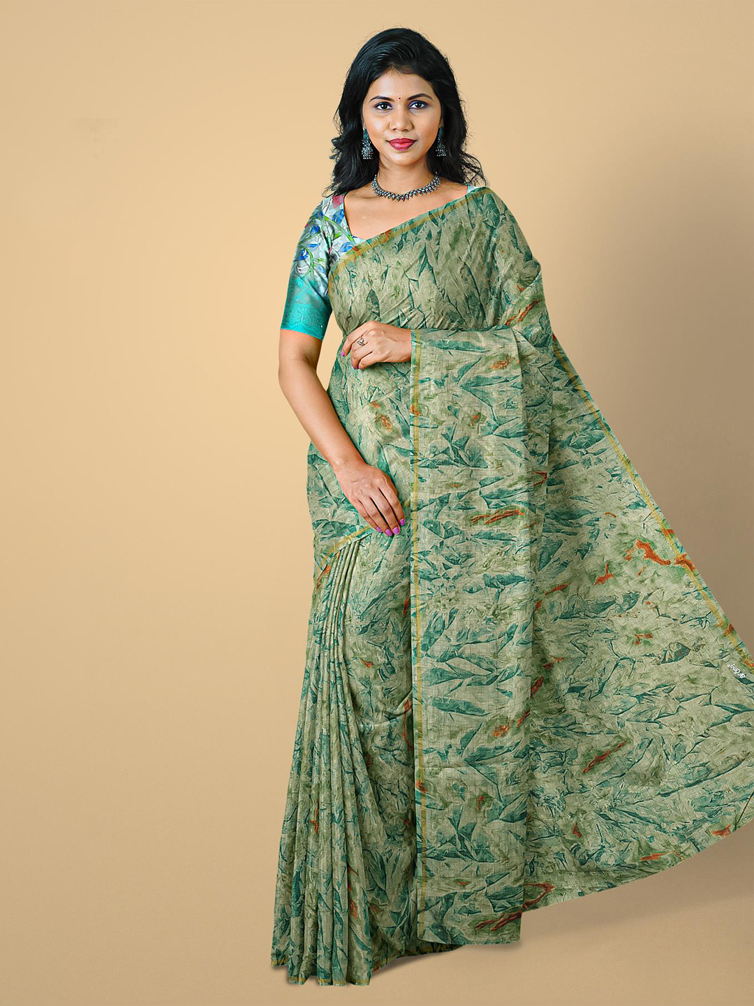 

Kalamandir Green & Red Jute Cotton Saree