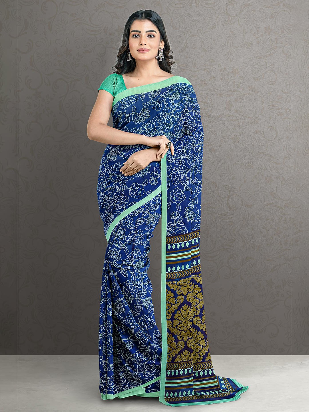 

Kalamandir Blue & Green Floral Silk Blend Saree